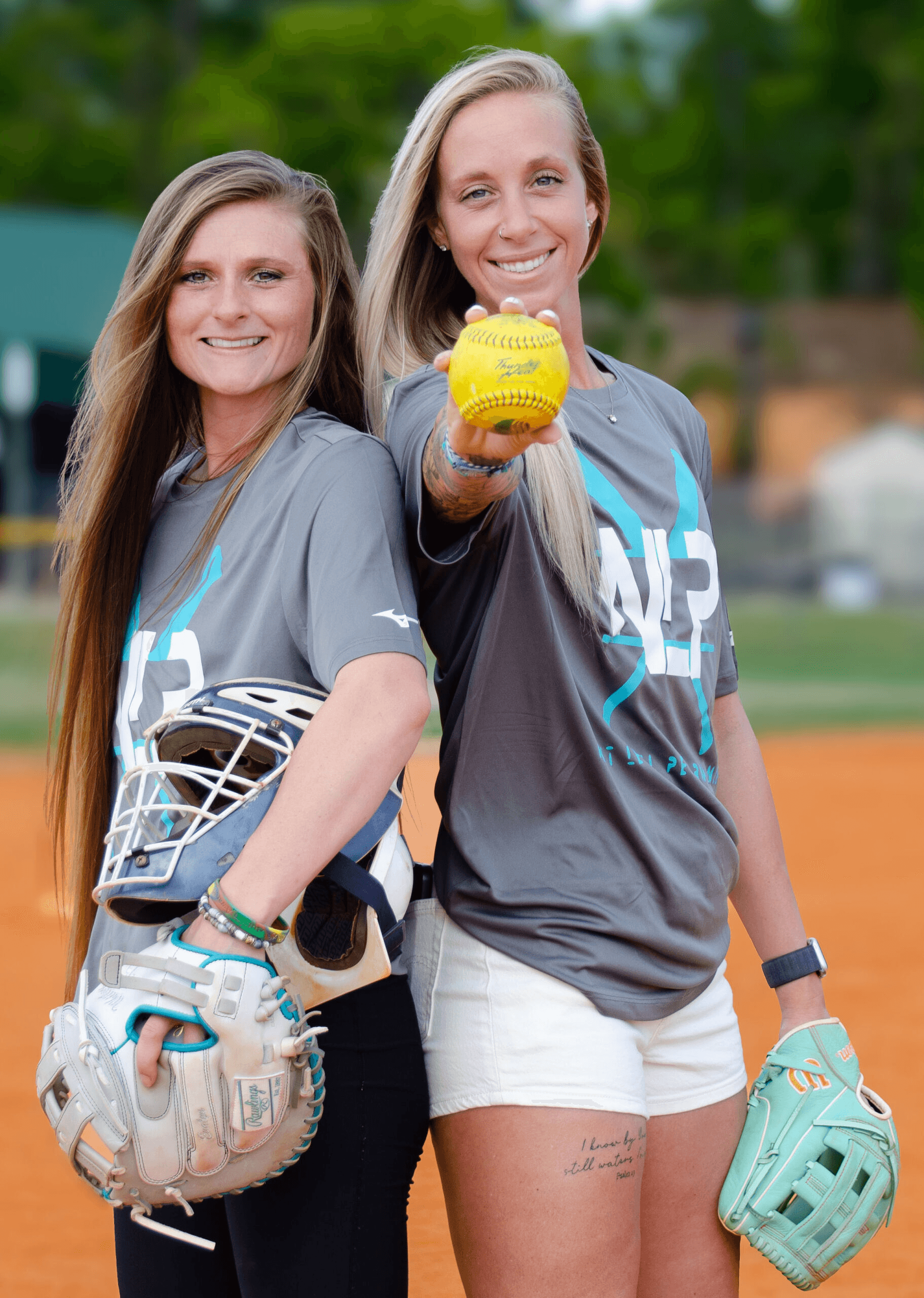Next Level Performance coaches on the softball field